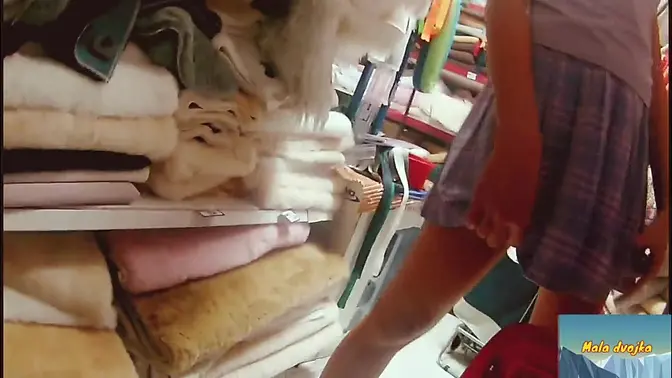 Under the skirt without panties in the store