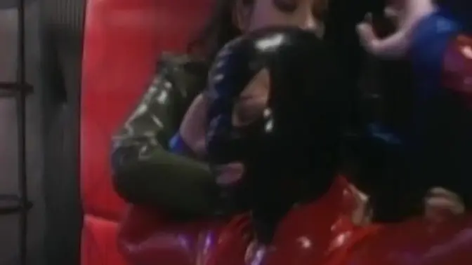 Leather-clad lesbians toy vintage mistress