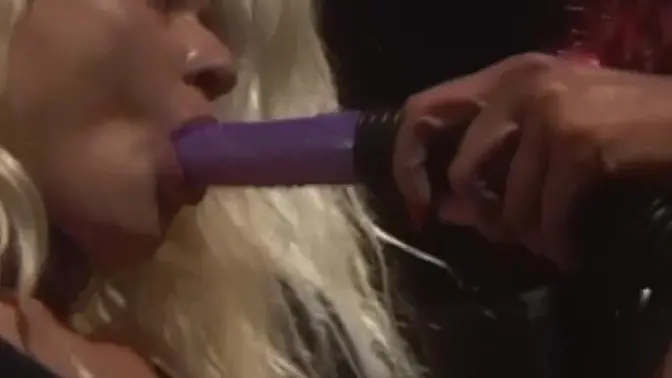 Dominant redhead uses massive dildo on submissive lesbian babe