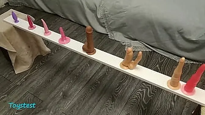 She takes a plug in her ass and double dildos in her pussy