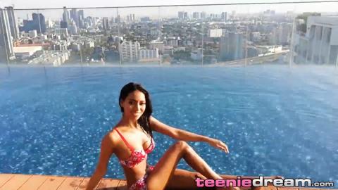 Hot teen seduces with smooth brown skin and intense allure