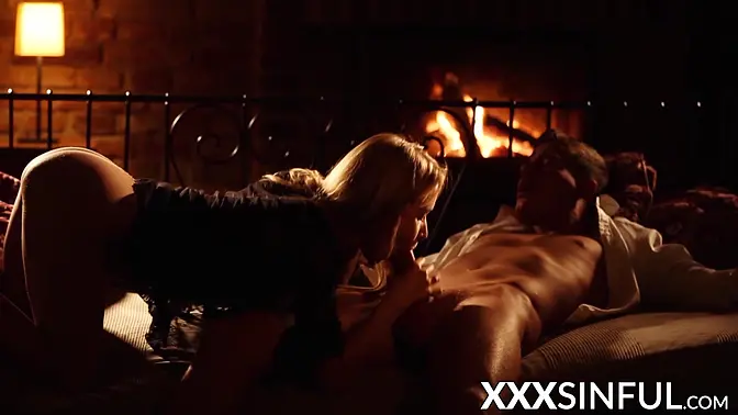 Babe sucks big cock by fireplace