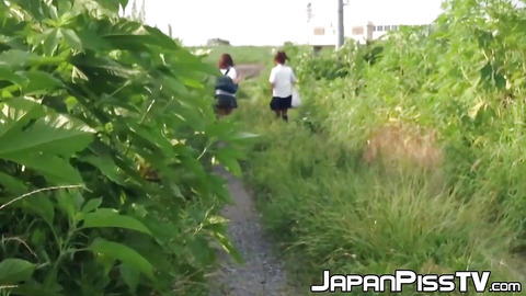 Schoolgirls from Japan peeing while taking a hike