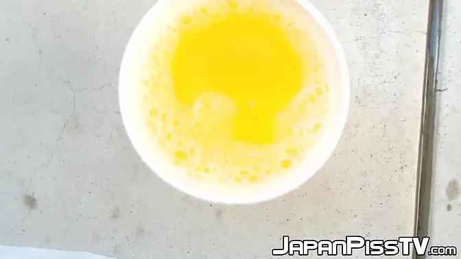 Kinky Japanese Teen Pisses Hard on Camera