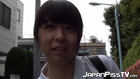 A cheeky student accepts the dare and lifts her skirt to stroll through the streets