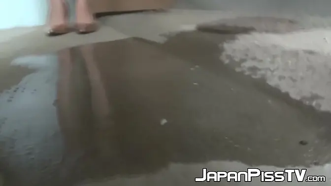 Teasing a Japanese babe's peeing in kinky lingerie