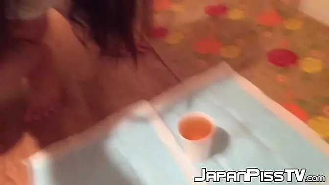 Hairy Japanese teen pees in makeup cup