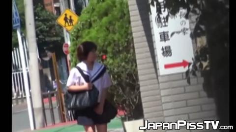 Redhead Japanese with short hair is peeing on the streets