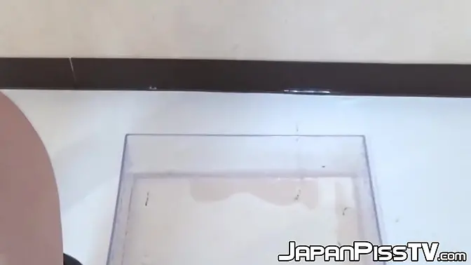 Cute Japanese girl pees in red panties