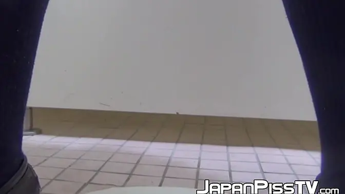Japanese schoolgirls rub their wet pussies in school toilet