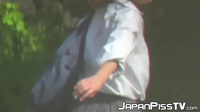 Japanese lady finds a secluded place to pee in public space