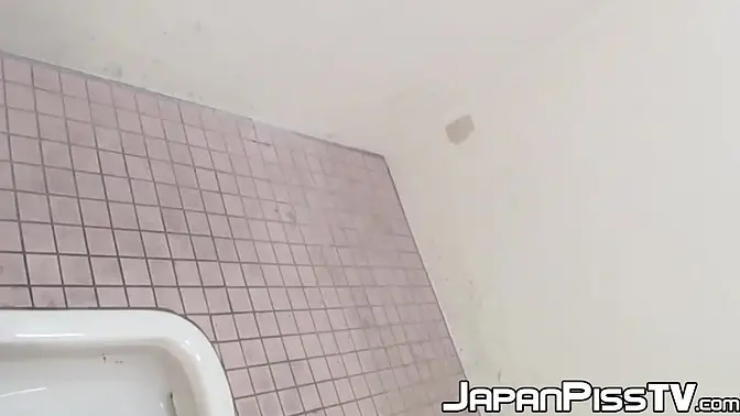 Hairy Asian Babe Pees in Public Restroom