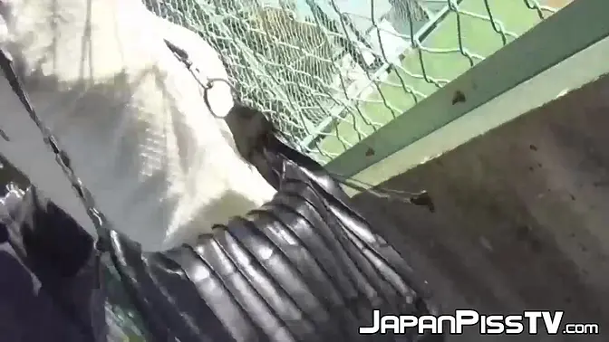 Bound Japanese babe pees herself in sexy outdoor bondage scene