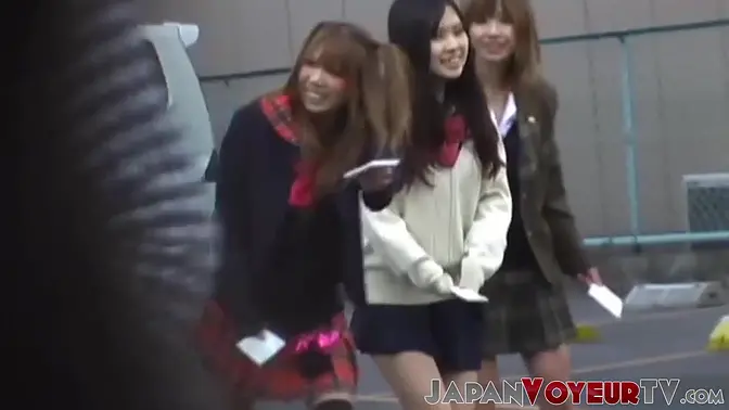 Asian schoolgirls in sexy costumes caught on hidden camera