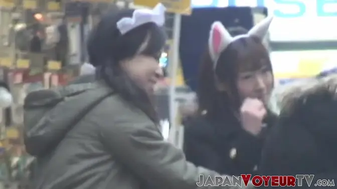 Asian schoolgirls in sexy costumes caught on hidden camera