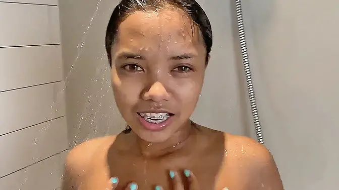 Teeny Oriental girl with braces spreads legs for foreign cock