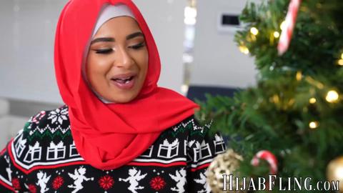 There is nothing like Christmas spirit to spice things up as Arab babe rides a fat cock