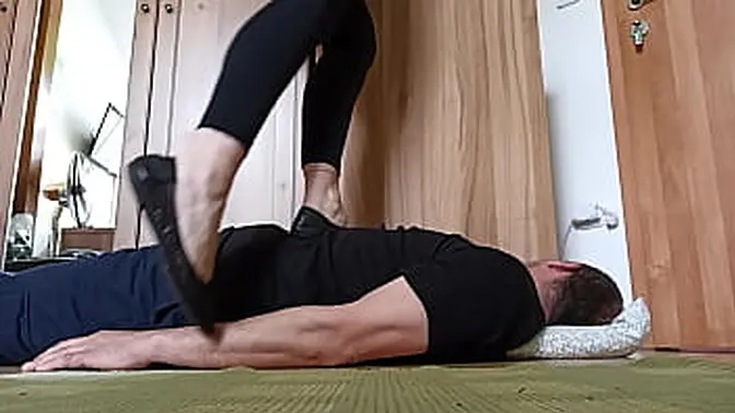 Fullweight woman tramples on his face