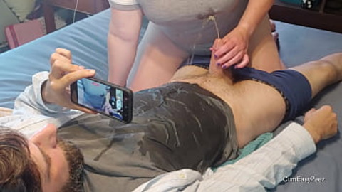 Liza gives a great handjob, then they both urinate on each other