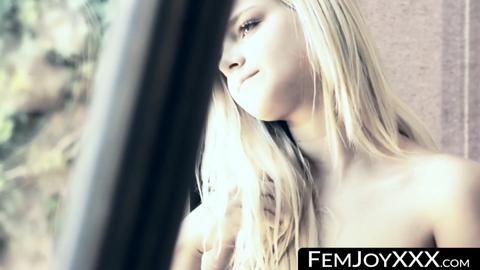 Two stunning women embrace following a sensual nude massage