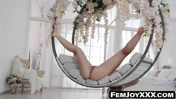 Angelic blonde beauty teases with shaved pussy