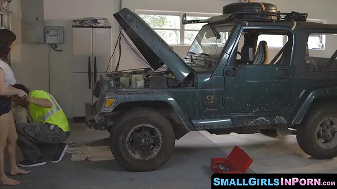 Tattooed mechanic gives intense hardcore to petite babe