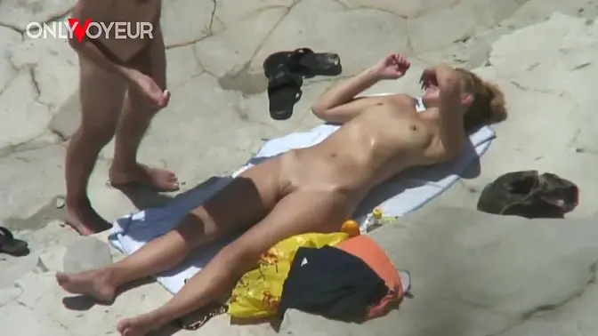 Risqu� beach quickie for young couple