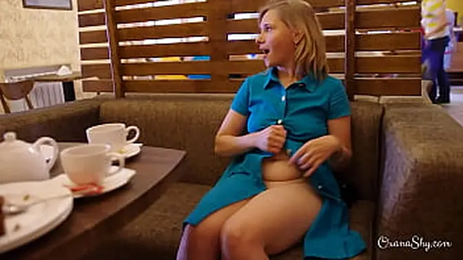 Exhibitionist wife flashes pussy and teases in public cafe