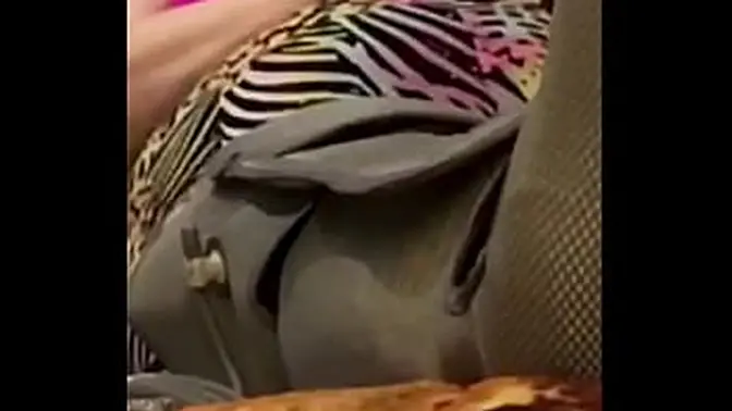 Medical Massage Therapy while ignoring naked legs on phone