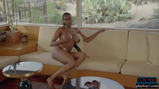 Huge boobs black babe shows off her amazing body with hairy pussy for Playboy