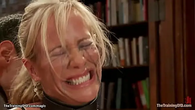 Bound and Gagged MILF enjoys flogged and fucked with a dildo