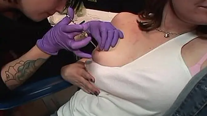 Tattooed MILFs and lesbo action at private society shop