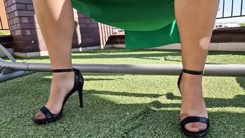 Sun-kissed Wanilianna flaunts seamed nylon thighs, roof-top temptress beckoning you with wicked abandon.