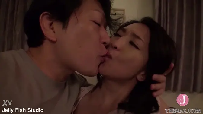 Mature Japanese MILF takes it standing doggystyle