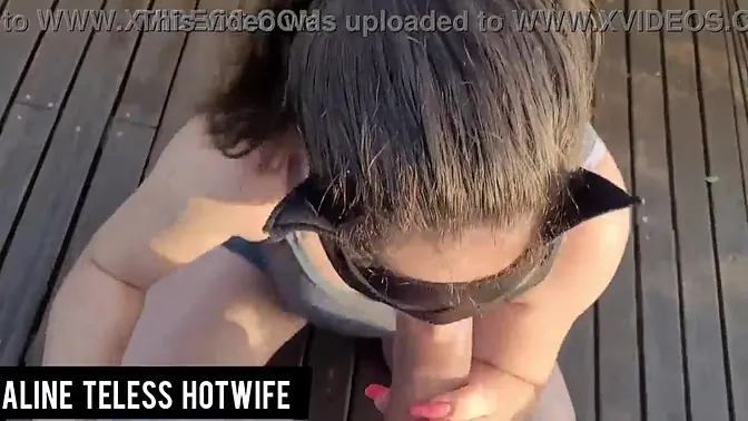 Naughty wife sucks friend's cock at the beach