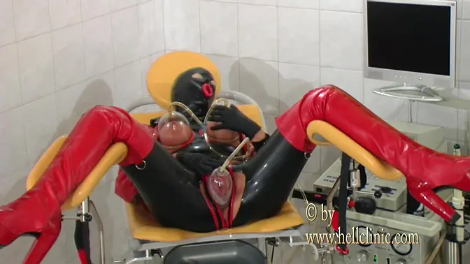 Rubber latex bondage babe gets extreme vacuum pumping