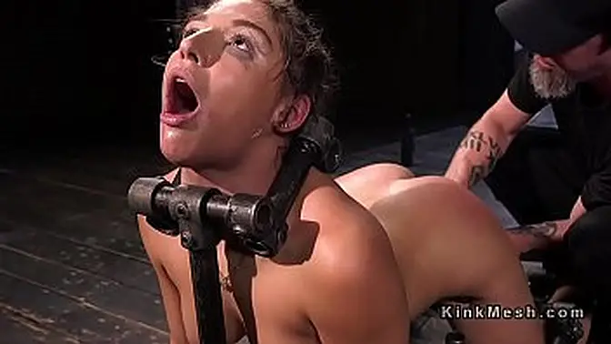 Bound slave girl gets speculum inserted into her cunt