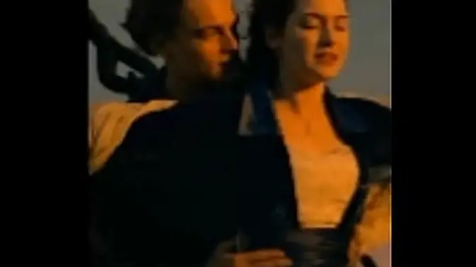 Blonde with big tits licks her man's cock