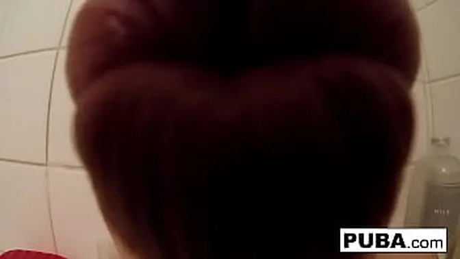 Wet busty babe massages her big tits in the bath