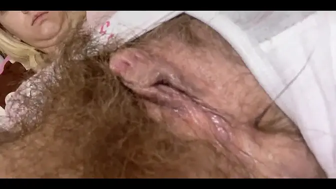 Girl rubs her big, hairy clit and makes her panties wet with cum