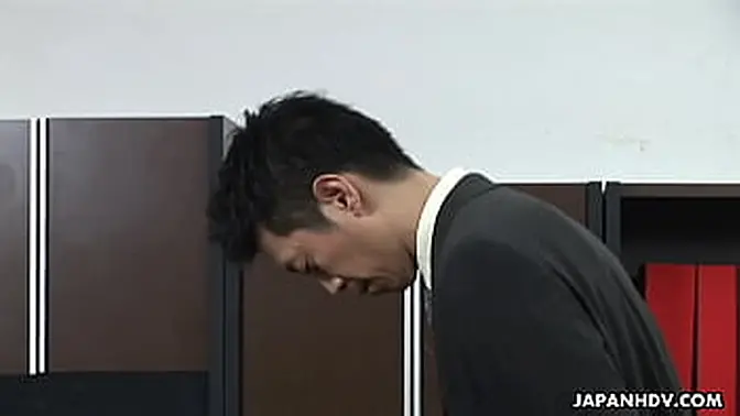 Office Seduction: Asian babe deepthroats and toys her pussy