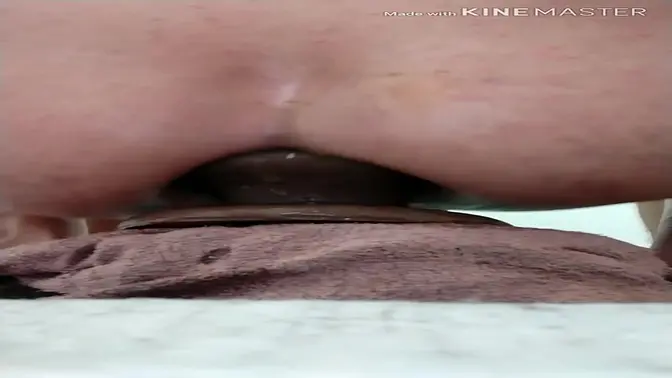 Ass stretched with plug before DP with two big dildos