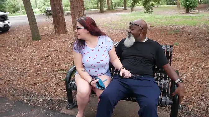 Glasses-wearing MILF strokes and devours big black cock in public