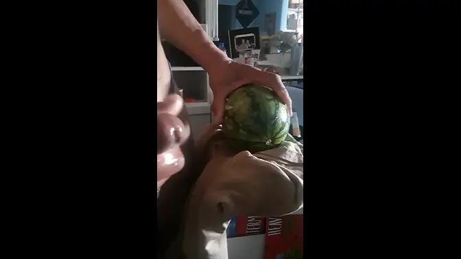 Solo guy strokes his cock to a fetish video