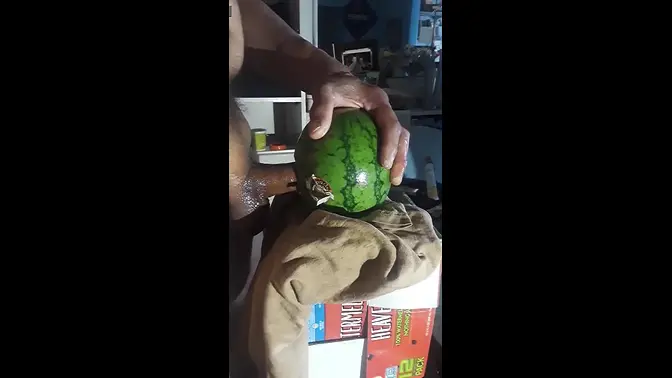 Solo guy strokes his cock to a fetish video