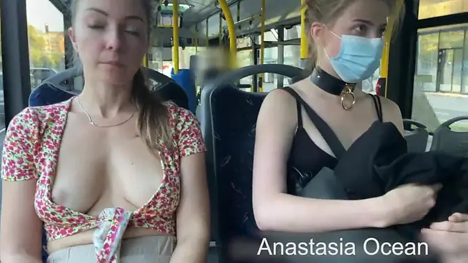 Exhibitionist babe shows off her nude nipples on public city bus