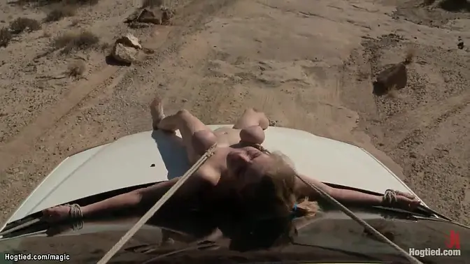 Rough desert BDSM punishment for big-titted slaves Cherry Torn and Penny Pax