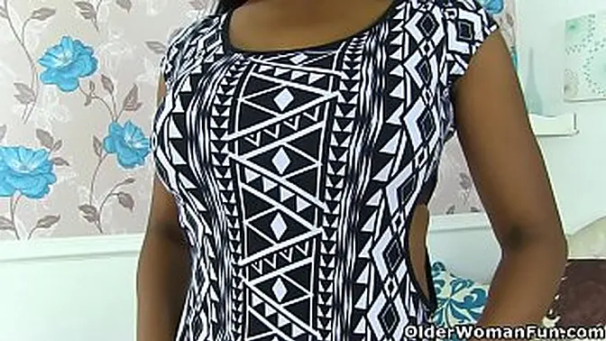 British MILF pleasures her pink and pantyhosed pussy