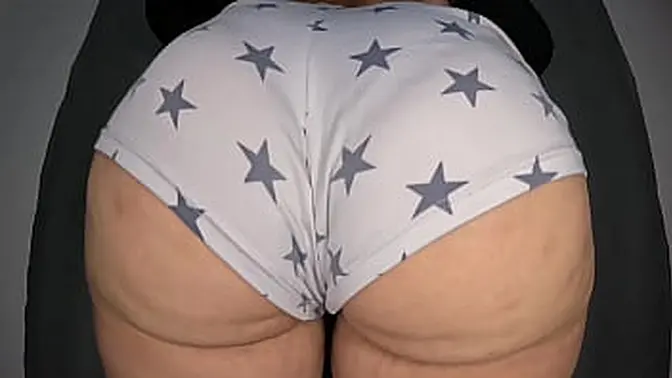 Busty milf shows off her huge, round booty