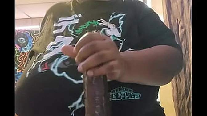Chubby Black Woman Wearing T-Shirt Sucks Big Dildo